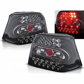 Schwarze LED Rückleuchten VW Golf 4 IV 97-03 mit roten LEDs und Chromringen