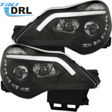 TRU DRL LED Scheinwerfer für Opel Corsa D schwarz mit Tagfahrlicht-Streifen