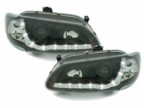 Schwarze LED Scheinwerfer für Renault Megane 96-02.99 mit Tagfahrlicht-Optik