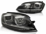 Schwarze LED-Scheinwerfer für VW Golf 7 mit markanten Lichtbändern und moderner Optik
