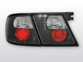 Schwarzes Rückleuchten Set für Nissan Primera P11 1996-1998, mit roten Bremslichtern und klaren Blinkern